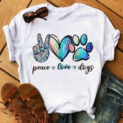 This super cute Peace, Love, and Dogs t-shirt is a perfect way to express your passion for dogs while showcasing your style. With its vibrant colors and adorable design, this t-shirt is sure to turn heads and bring a smile to everyone's face.