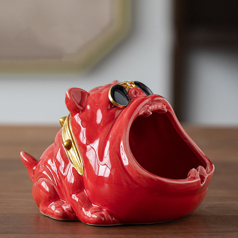 Our Cartoon dog ceramic ashtray is the perfect addition to any dog-lover's home. With its cute and quirky design, it will bring a smile to your face every time you use it. Made with high-quality materials, it's both functional and stylish, making it a great gift for yourself or any dog-loving friend who smokes.