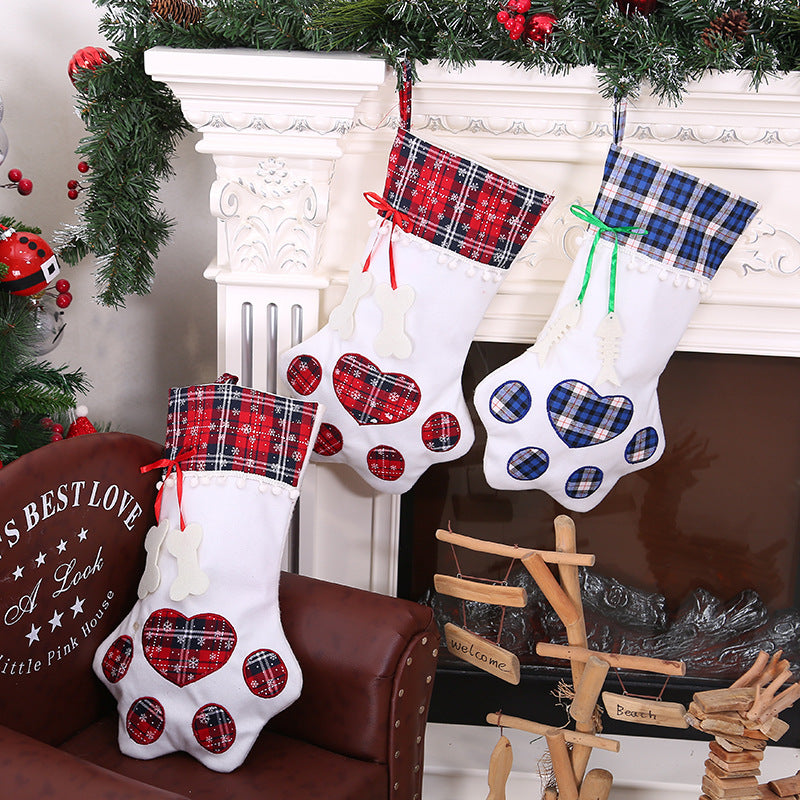 Our Dog Paw Christmas Stocking is the perfect way to celebrate the holiday season with your furry friend. With its adorable paw-print design, it will add a touch of fun and personality to your holiday décor. Made with high-quality materials, this stocking is both durable and long-lasting, ensuring that it will be a cherished part of your holiday traditions for years to come.