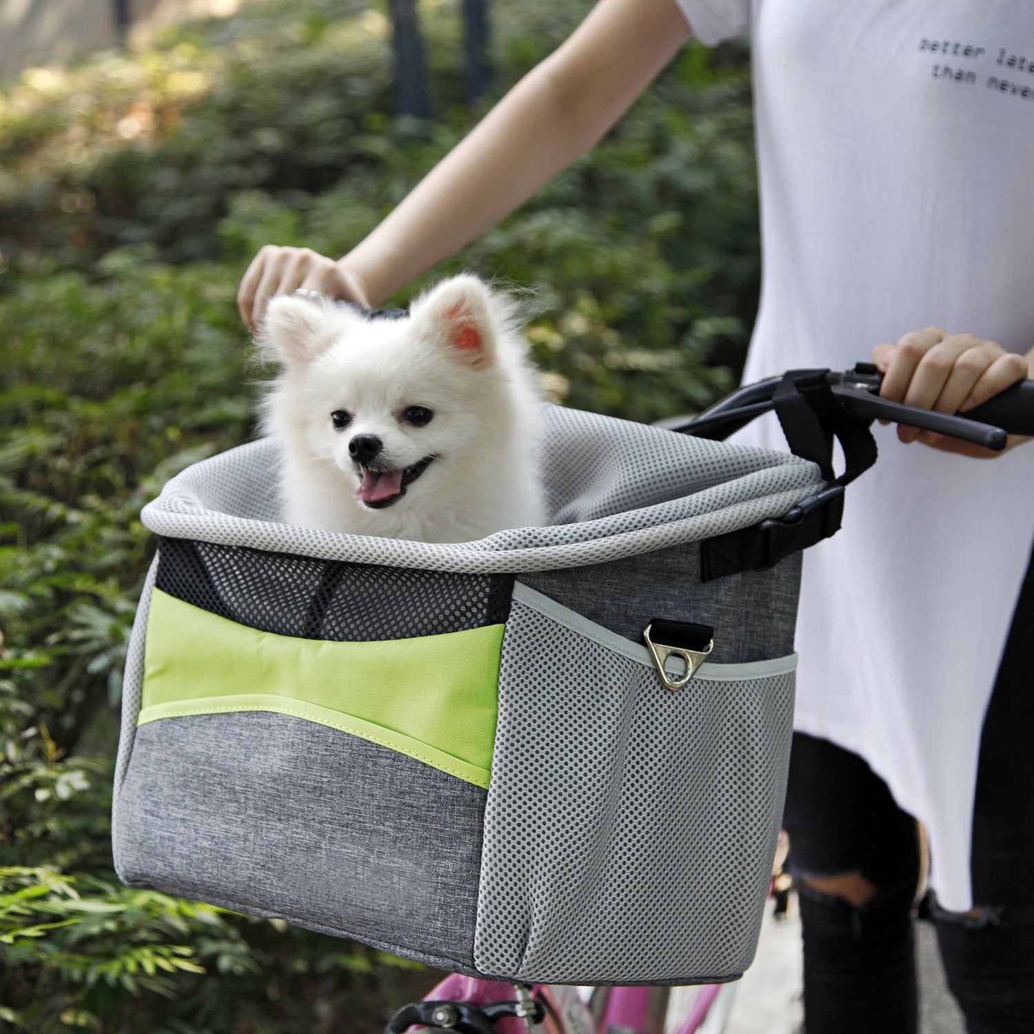 This bicycle handlebar dog basket is designed to carry a small dog on a bicycle and easily attaches to the handlebars to provide a safe and secure place for a dog to sit while riding.