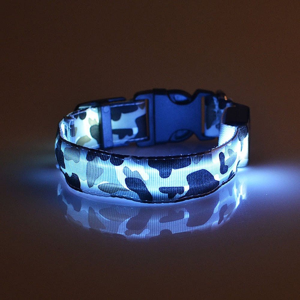 This LED Light-Up Dog Collar is equipped with lights that emit bright, colorful beams and is designed to make dogs more visible in low-light conditions and can help keep them safe while walking or playing in the dark. The dog collar is made of nylon and plastic, is sturdy, and wear-resistant. It has 3 adjustable lighting modes: constant on, fast flash, and slow flash. 
